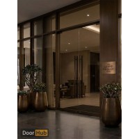 Tinted Glass Pivot Door 10mm UAE for Luxury Hotel Suite Entrances